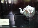 A polygonal teapot, officially labeled "folded square pot."

