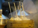 A form of xiao long bao (Shanghai soup-filled dumplings) with straws.  
Clearly targeting tourists for whom soup dumplings are new, I can't 
imagine these being good.  This isn't how one is supposed to eat the 
dumplings!

