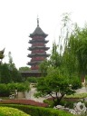 A long nearly-360-degree panoramic movie in Panmen scenic area,
encompassing the main lake, a multi-story building, Ruiguang Pagoda (the
tall tower), a few single-story buildings, gardens, ponds, and a zig-zag
bridge.
