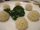 Steamed hedgehog-shaped buns.  Boring.  The little filling there was was 
dry diced meat, and it had little flavor anyway.
