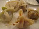 Top: fried rice dumpling bag.  Really good, though didn't taste much 
like fried rice.
Left: spicy chicken?
Right: pork and mushroom?
Bottom: tomato dumpling.  Taste like it's filled with stewed, canned 
tomatoes, slightly sweet.

