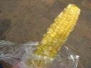 Corn on the cob.  Bad.  No sweetness; pure, boring carbs.  I took three 
bites and tossed it.  I bought all the components of my lunch from 
stands or stalls on the street.

