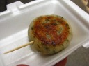 A dumpling: a noodle wrapper made of glutinous rice flour filled with 
greens and pork.

