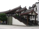This pedestrian overpass blends in with the pagoda and temple's 
architecture.

