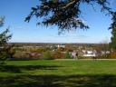 Portland, as seen looking over the park along the Western Promenade / the
West End.   The Western Promenade is an area with large, boxy
single-family houses.
