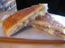 We ate lunch at Duckfat, a small bistro with tall 
stools and bar seating. 
This is our panini of roasted pork, apple compote, garlic aioli, and 
cheddar cheese.  It was a respectable and cheesy panini.

