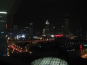 The skyscrapers around People's Square at night as seen from my
company's office.  The Shanghai Museum can be just made out in the dark
patch.  From our apartment during the summer, we could see in the
distance the building with the red eyes.  We always imagined it to be an
evil robot.

