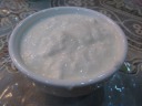 Yogurt.  Definitely made from goat's milk.  Regular yogurt, meaning it's a
bit on the tart side.  Di Yin thought it went well with the rest of the
meal.

