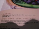 The menu description of the previous item.  The English is pretty accurate;  
the Chinese literally says: Kong (as an abbreviation of Hong Kong) style
pot small (but only means this if said in Cantonese)  
cooked-rice/food/meal.  (gang3 shi4 guo1 ___ fan4)

