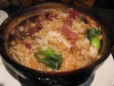 Di Yin's dish: Hong Kong style claypot rice with goose, pork, ham, and 
bok choy.  I definitely didn't like this dish (none of the meats nor the 
rice).  For instance, I thought the ham was sweet and nasty and didn't 
even finish one piece.  Di Yin didn't like the dish much either, though 
seemed to be more willing to eat it than I and even expressed liking the 
goose.

