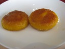 Fried pumpkin cakes.  The outside is gooey like melted cheese, but it's 
actually fried glutinous rice flour.  Decent, but I don't think people who 
lack my love of pumpkin squash will like it.


