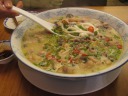 Fish soup, with noodles and tons of chilies.  Decent.  The broth was thick 
from cooked-down (pork?) bones.
