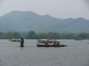 Boats on the West Lake, along with two pagodas in the lake that are 
traditionally lit by candles on the Mid-Autumn Festival.
