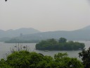 One of the two mid-lake pavilions (islands), and, beyond that, Three Pools 
Mirroring the Moon island (which we previously visited), and, finally, the 
far side of the lake and the Leifeng Pagoda.
