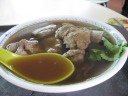 Di Yin was hungry and wanted to try some bak kuh teh (pork rib soup) from 
the nearby hawker center.  I tried some.  It's much like pho except made 
from pork, not beef.

