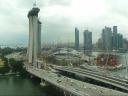 A panoramic movie begin at the Esplanade and veers left (south) to show 
Marina Bay.  It ends looking down (to show how high we are).
