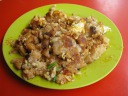 The "black carrot cake" (actually, a daikon radish omelette with chilies)  
that I ordered from this stand.  It was definitely greasier than I like,
but was nonetheless decent.
