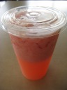 A tomato juice.  They made this by pushing chopped tomatoes through a food
processor.  Definitely tangy.  Good with our food, though it may not have
been good alone.  Nothing like the canned tomato juice served on planes.

