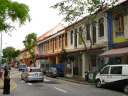 Shophouses along Joo Chiat Road.   Notice the 7-Eleven?  If 
everything looks nice, even discount convenience stores end up housed in 
attractive buildings.

