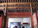 Look at all the carved dragons on lintels!  Also look at the
wallpaper--it's not a repeating pattern; the dragon symbol appears in many
different poses and orientations.

