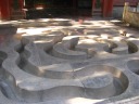 In the Pavilion for Bestowing Wine, a winding path of liquid is carved 
into the stone floor.

