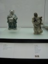Shiwan statues in the Hong Kong Museum of Art.  The one on the left seems 
secretly delighted with his pretzel.  The one on the right seems happy in 
general.
