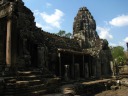 Getting closer to the center of Bayon.  Note the Buddha faces at the top 
of the tower.  (Two are visible in this picture.)
