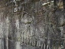 One of the many reliefs surrounding Bayon.  This is the Chinese-contingent
of the Khmer army on the march, complete with elephants.  (The Chinese people 
can be identified in these reliefs by their topknots and small beards.)
