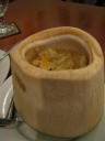 "Amok fish served in green coconut."  Though still good, it wasn't as 
good as the amok fish we had at 
lunch (seen in a 
coconut).  Maybe this is sweet?  Maybe the soup/sauce tasted less 
of coconut milk?  In other news, the coconut, younger than lunch's, 
had lots of sweet, buttery coconut flesh.

