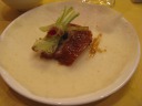 My peking duck wrap, complete with a blossom of chives (?) and a light 
smear of hoisin sauce.

