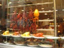 Roasted meats in the window.
