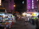 Street food stands along one side-street.
