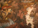 A surprising contrast: at left, a two multi-armed monsters fight many
troops; at right, mythical beings and humans are each peacefully playing
in or near the river.

