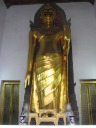 A Buddha statue in a minor prayer hall.  It could almost be a casket.
