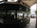 The hot food in the buffet was prepared and presented outdoors at these 
bars overlooking the river.
