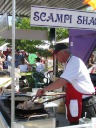 The shrimp and mushrooms looked delicious as they were being cooked.  
And look at the chef concentrate!
