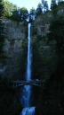 A higher-resolution shot of Multnomah Falls.  The falls have two 
segments.  The overlook bridge is about a fifth of the way up the upper 
segment, which is by the far the largest one.  I believe I climbed 
to the overlook bridge when I visited in 2002, so I didn't feel the need 
to do so this time.
