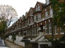 The row of identical townhouses directly across the street from my 
apartment.  I took this picture on November 10, 2010.

