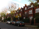 Brondesbury Road (still), on the way to Queen's Park (one high street 
near us).  I walk down this road this direction to get to Queen's Park. 
(In contrast, when I go to work, I walk down my own street, Brondesbury 
Villas, to Kilburn High Road.)  I took this picture on November 
24, 2010.

