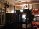 We sat in this corner near the front of Betsy Smith, under a 
chair-with-a-chandelier-on-it turned upside-down, and in clear view of 
similarly upside-down pink flamingos. 
Incidentally, I'd previously 
photographed most of the rest of Betsy Smith's quirky interior.
