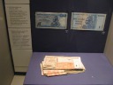 Read the descriptions of and see items 6 and 7. 100 
trillion dollar note / one hundred trillionOn the special 
exhibit on African money and stamps.
