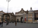 A 360 degree panoramic video of the large Piazza del Popolo.  This video 
begins looking north toward two similar-looking buildings: Santa Maria 
del Popolo (right) (a rather famous church) and a Carabini (military) 
building (left) (done in the same style). The video then swings 
clockwise, first passing a building with that appears to be a trump 
de'liol facade, then a fountain, then another pair of symmetric 
buildings (these are both churches: Santa Maria in Montesanto (left) and 
Santa Maria dei Miracoli (right) ) at the piazza's southern entrance.  
Interestingly, in the center of the piazza is an Egyptian obelisk that 
was moved to the Rome in 10 BCE.  It's actually the second obelisk we 
saw this day (see the first.
