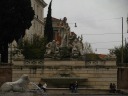The Fontana di Nettuno is on the piazza's west side, opposite from the 
Pincio.  The small lion fountain in the foreground is one of four that 
sits at the base of the Egyptian obelisk.
