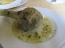 Roman-style artichoke.  Definitely good.  Better than the usual 
American/French way of steaming artichokes and then dipping the leaves 
in a cream sauce.

