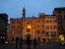 In Piazza Farnese, the Church of Santa Brigida and a fountain.
