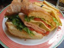 "Honey smoked turkey, Swiss cheese, lime chipotle mayo, lettuce, tomato 
& pickle on ciabbata" along with French fries.  The fries were good and 
surprisingly addicting.  (I think it had been a while since we ate 
fries.)  This sandwich, like the previous one, was pleasing.  And both 
sandwiches were enormous; half a sandwich probably would've sufficed a 
normal person.  However, we were hungry and they were good enough that 
we ended up finishing them all (and then didn't eat dinner until past 
8pm).
