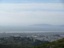 Looking north-west from the park, one can see the sandy beaches along 
San Francisco's Richmond and Sunset districts.  In the distance are the 
Marin headlands (the north bay).
