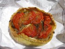 Our tarte with onions, tomatoes, and anchovy: a pleasing combination.
