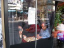 On the way home from Rue Montorguiel, Di Yin spotted many people playing 
Go in a cafe near us.

