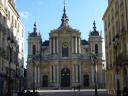 A large church, the Saint Louis Cathedral.  Notice the scale (look at 
the people at the cathedral's base).

